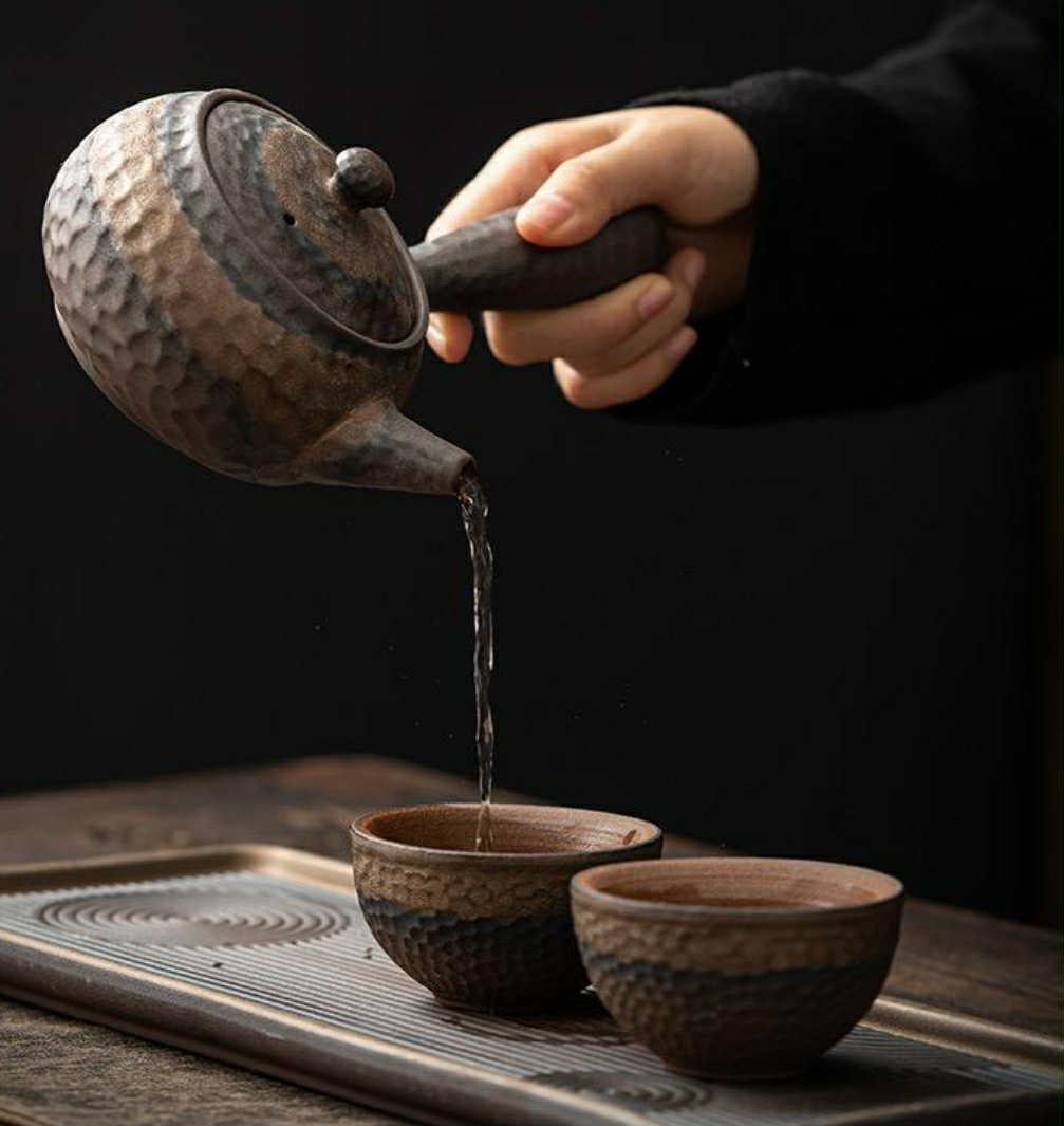 Théière et chauffe plat