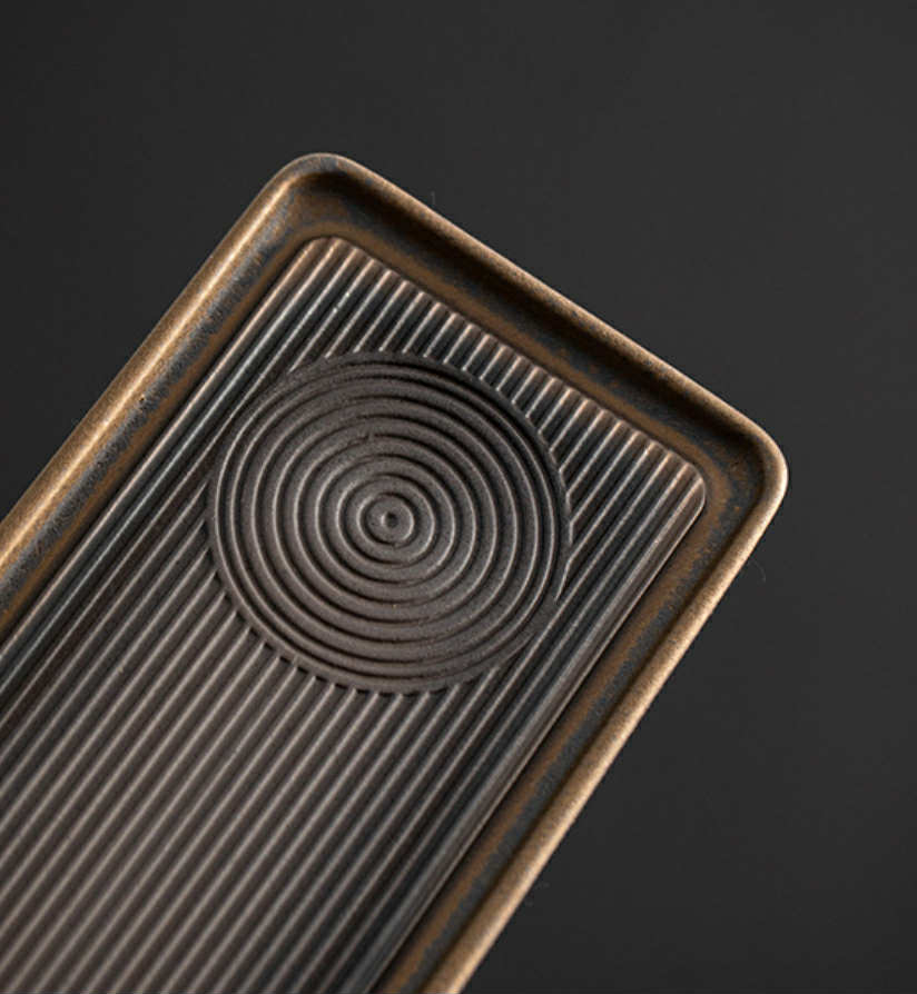 Théière, chauffe plat et tasses